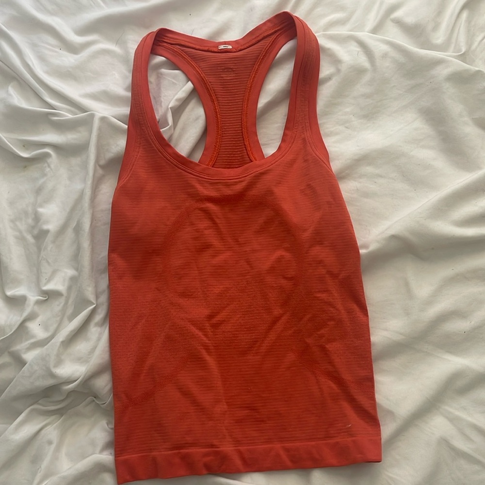 Lululemon women’s swiftly tech top size 4 Sherbet orange.